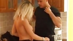 Busty blond teen gets a kitchen fuck